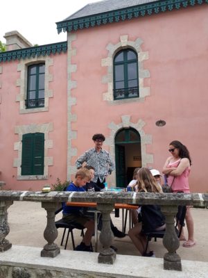 Hugo Michel, museum intern 2022 leading a workshop for children